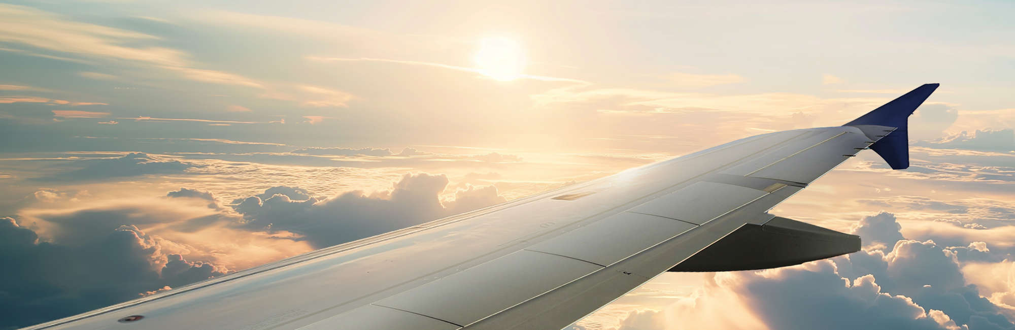 Looking out over the clouds in a Braathens Airbus 320.